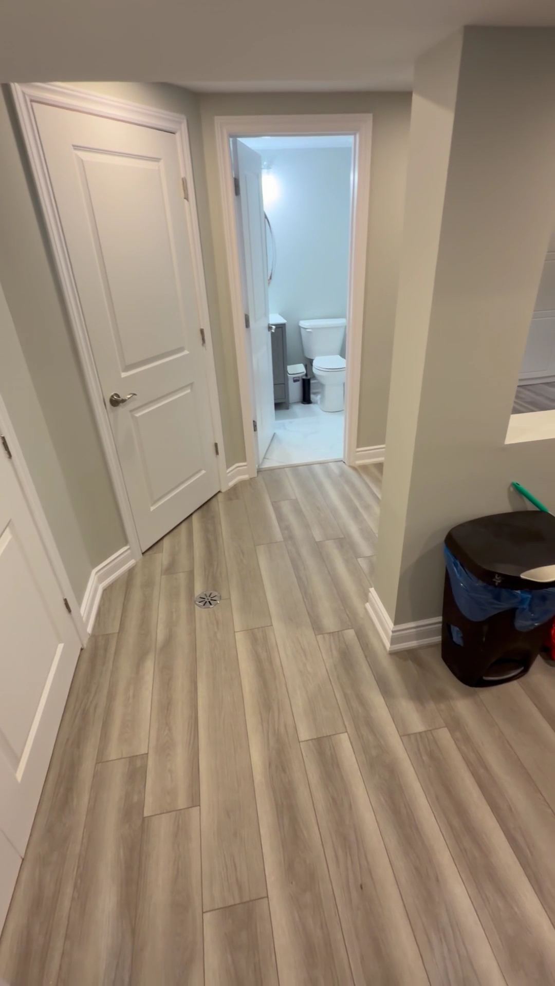 Finished hallway with new flooring after a water damage repair